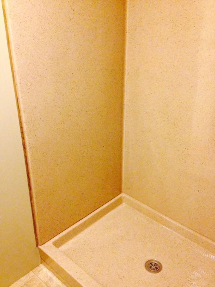 Faux granite shower stall refinishing by Heritage Coatings