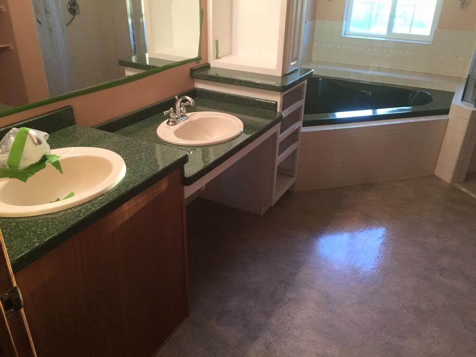 Green granite countertops with matching corner tub refinishing in Montana