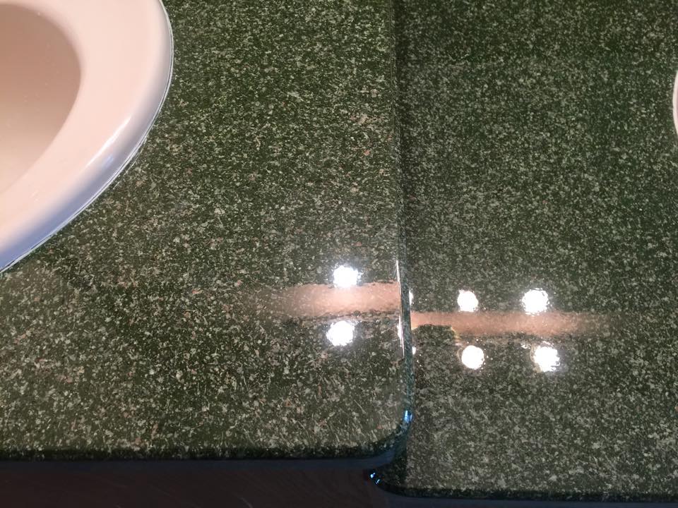 Green faux granite countertop refinishing by Heritage Coatings