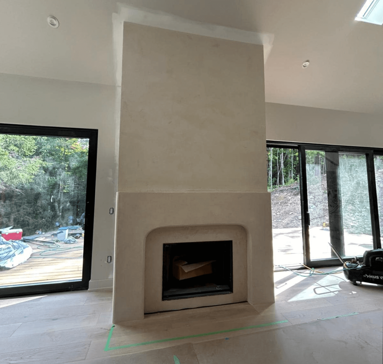 Microcement fireplace surround with seamless modern finish in Montana